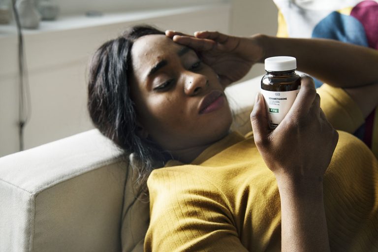 black-woman-headache-and-sleeping-PLRG89N-768x512