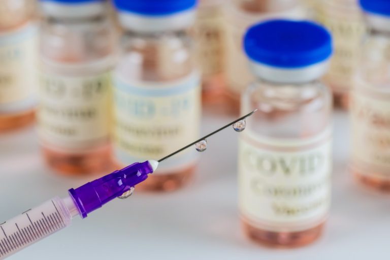 bottle-vaccine-coronavirus-vaccine-glass-vial-virus-prevention-american-vaccine-syringe-covid-19_t20_xXjbV2-768x512