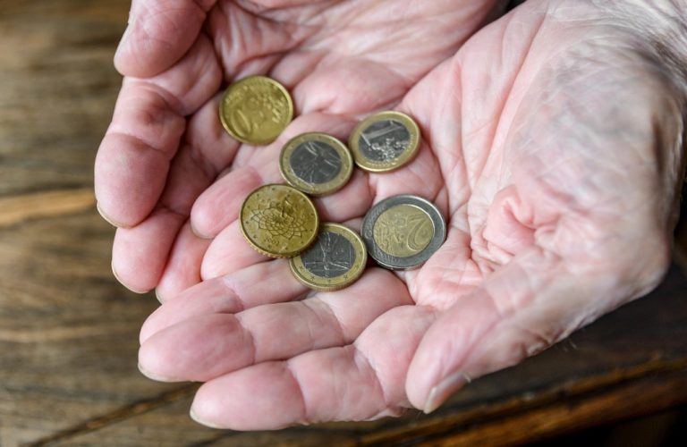 closeup-of-old-hands-holding-coins-age-cash-cent-charity-coins-concept-counting-donation-economy_t20_Jox9bl-768x500