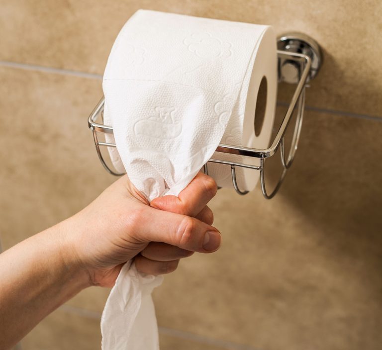 hand-pulling-toilet-paper-roll-in-holder-PUTLYV7-768x704-1